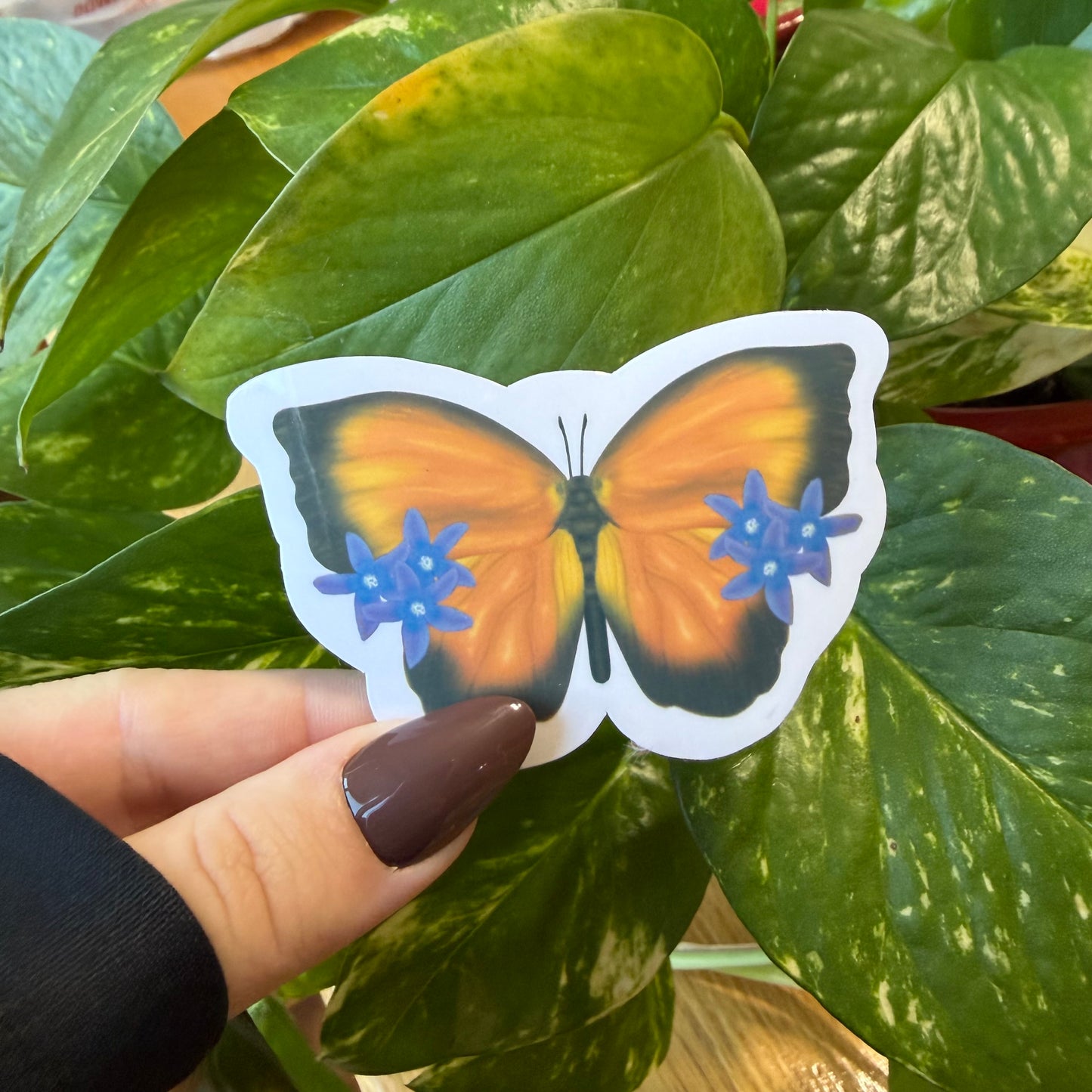 Orange Butterfly Sticker with Purple Flowers
